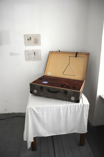 Electric Triangle displayed on a plinth.